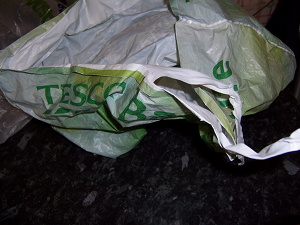 Tesco carrier bag with broken handle