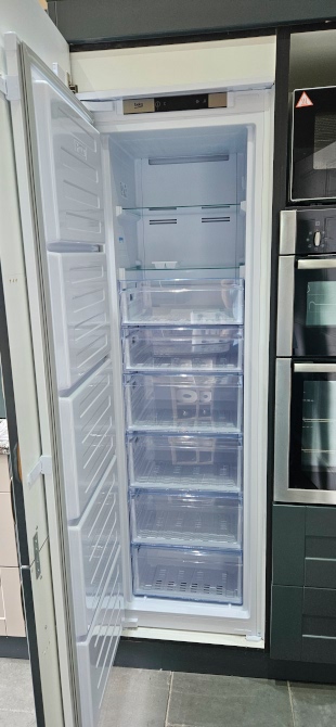 [White Beko integrated freezer (empty)]